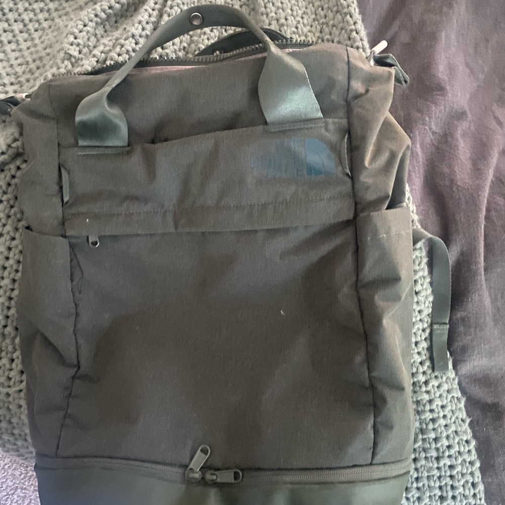 Green north face backpack / never stop utility